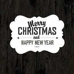 Image showing Merry Christmas Card With Dark Wooden Background, vector.