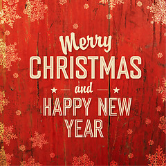 Image showing Retro Styled Christmas Card Design On Red Texture. Vector.