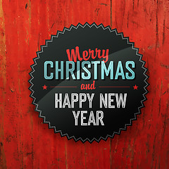 Image showing Merry Christmas Design On Red Planks Texture