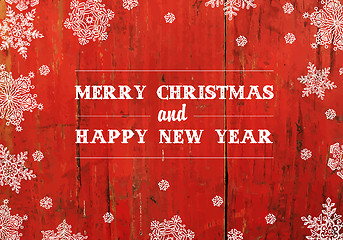 Image showing Merry Christmas Greeting On Red Planks Texture. Vector