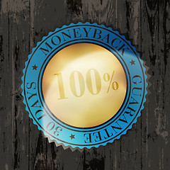 Image showing Moneyback Guaranteed Label with Gold Badge Sign on Wooden Textur