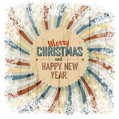 Image showing Merry Christmas greeting with colorful rays background, vector.