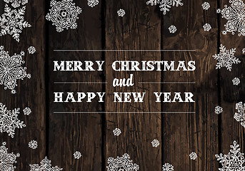 Image showing Merry Christmas Greeting On Wooden Planks Texture. Vector