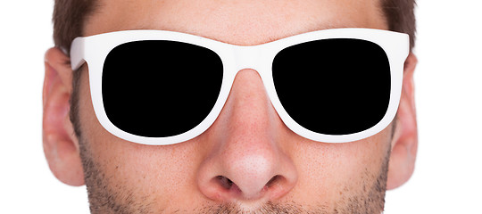 Image showing Close-up of a man wearing white sunglasses 