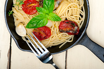 Image showing spaghetti pasta with baked cherry tomatoes and basil 