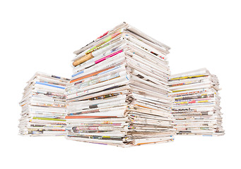 Image showing Three big stacks of newspapers