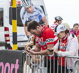 Image showing Spectators Checking Their Images - Tour de France 2013