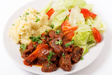 Image showing Greek beef in red sauce