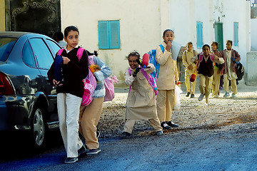 Image showing Pupils come back home from school