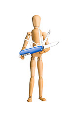 Image showing Wooden mannequin holding swiss knife