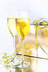 Image showing Two glasses of wine and a box on white background