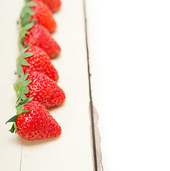 Image showing fresh organic strawberry over white wood