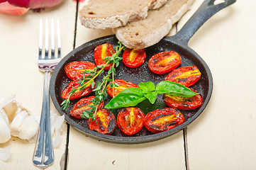 Image showing baked cherry tomatoes with basil and thyme