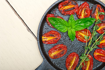 Image showing baked cherry tomatoes with basil and thyme