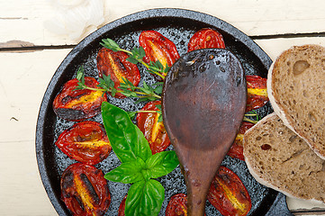 Image showing baked cherry tomatoes with basil and thyme