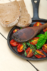 Image showing baked cherry tomatoes with basil and thyme