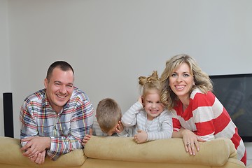 Image showing happy young family at home