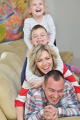 Image showing happy young family at home