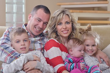 Image showing happy young family at home