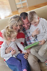 Image showing happy young family at home