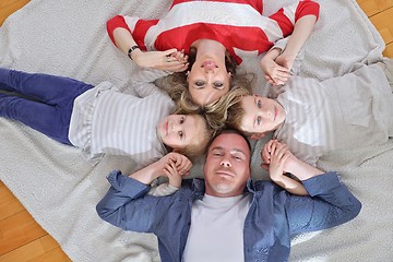 Image showing happy young family at home