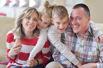 Image showing happy young family at home