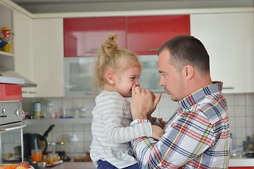 Image showing happy young family at home