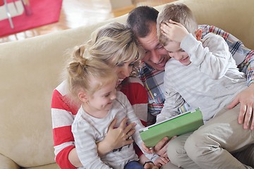 Image showing happy young family at home