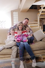 Image showing happy young family at home