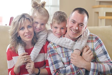 Image showing happy young family at home