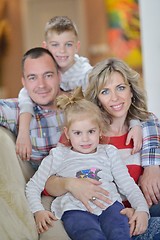 Image showing happy young family at home