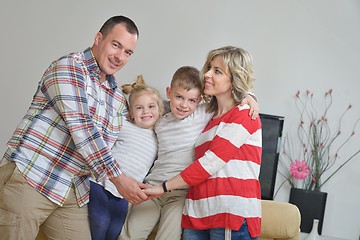 Image showing happy young family at home