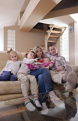 Image showing happy young family at home