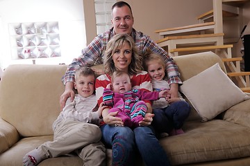 Image showing happy young family at home