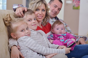 Image showing happy young family at home