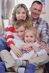 Image showing happy young family at home