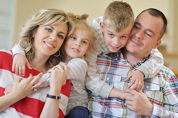 Image showing happy young family at home