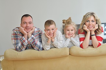 Image showing happy young family at home