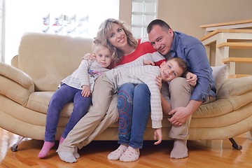 Image showing happy young family at home