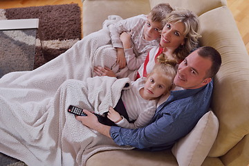 Image showing happy young family at home