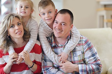 Image showing happy young family at home