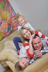 Image showing happy young family at home