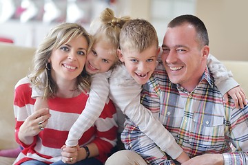 Image showing happy young family at home