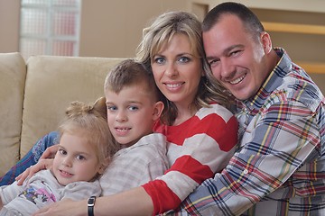 Image showing happy young family at home