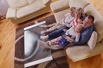 Image showing happy young family at home