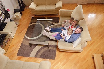 Image showing happy young family at home