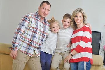 Image showing happy young family at home