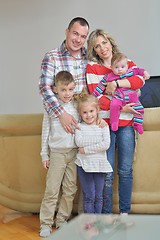 Image showing happy young family at home