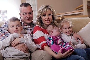 Image showing happy young family at home