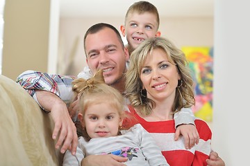 Image showing happy young family at home